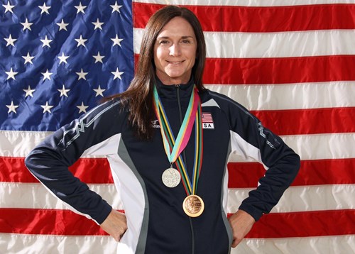 Weishoff representing team USA with her awarded medals 